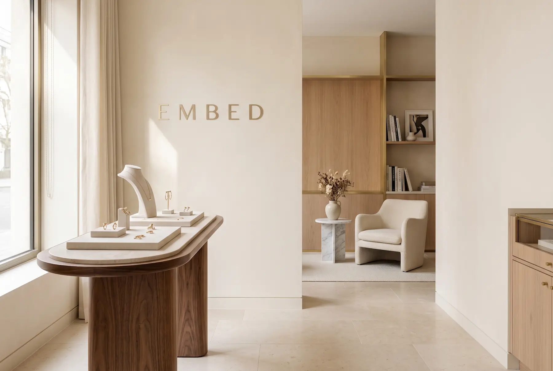 EMBED jewelry studio with elegant gold jewelry displays