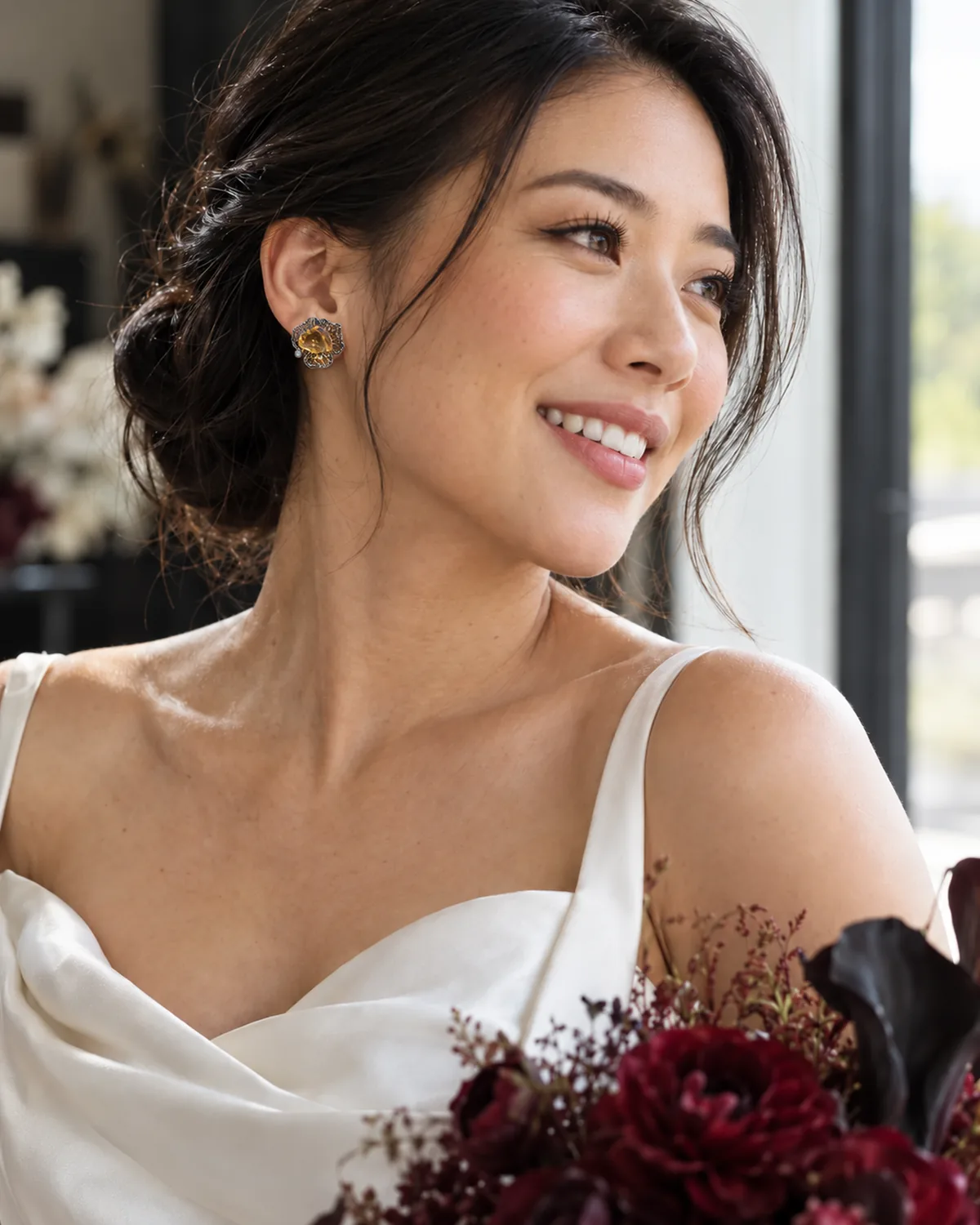 Bride wearing EMBED citrine earrings